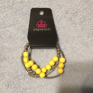 Yellow and silver paparazzi bracelet.